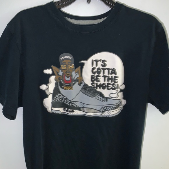 jordan shirt with shoes on it